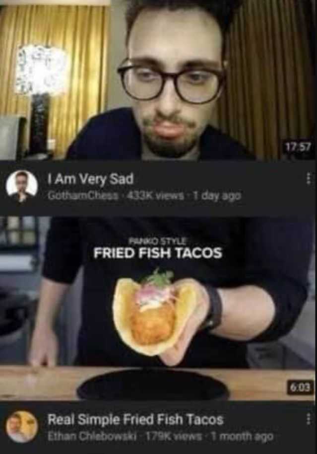 fish tacos on a plate being served by a man