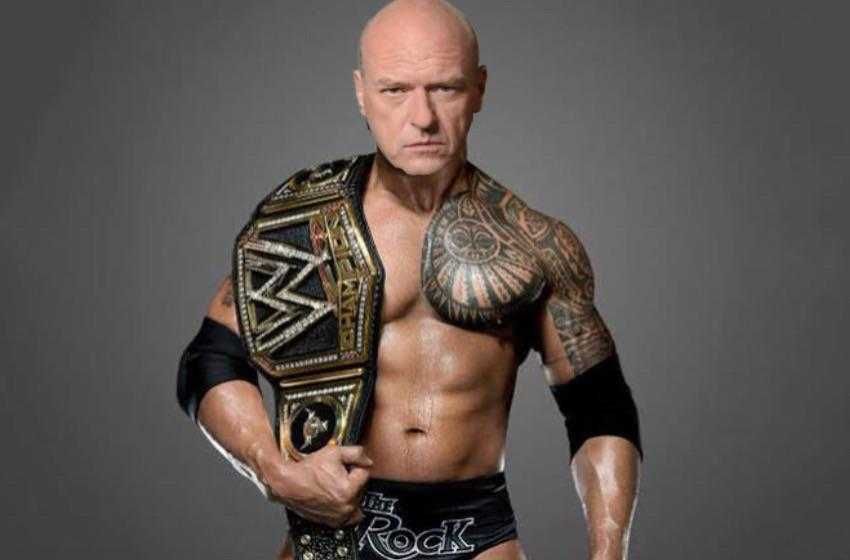 a man with a tattoo on his chest and a wrestling belt