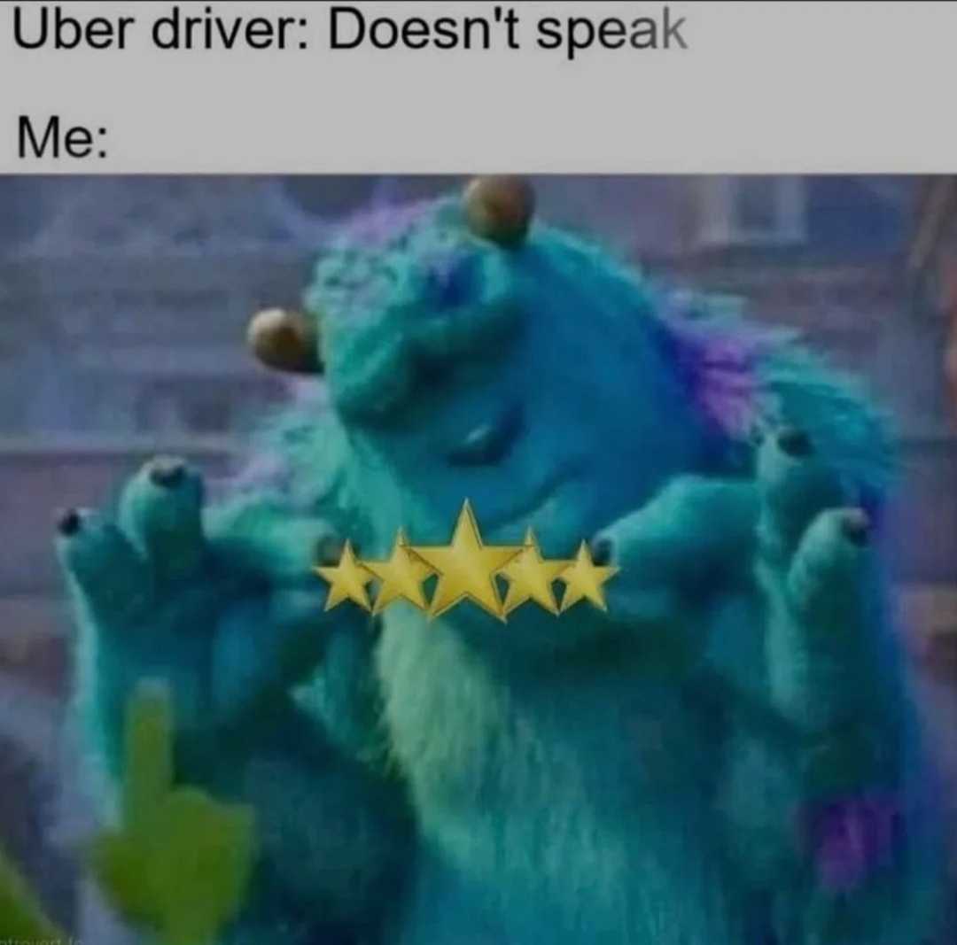 a close up of a blue monster with five stars on it