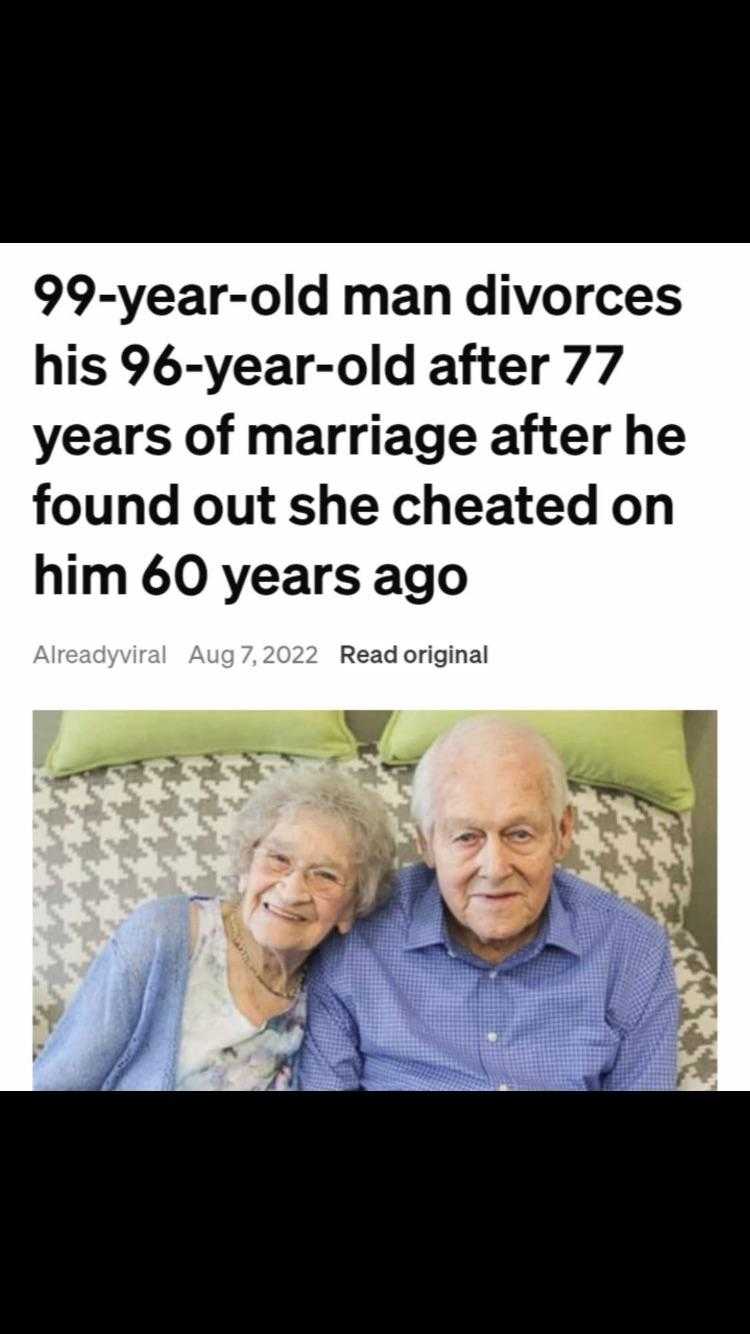 a close up of a person laying on a bed with a woman