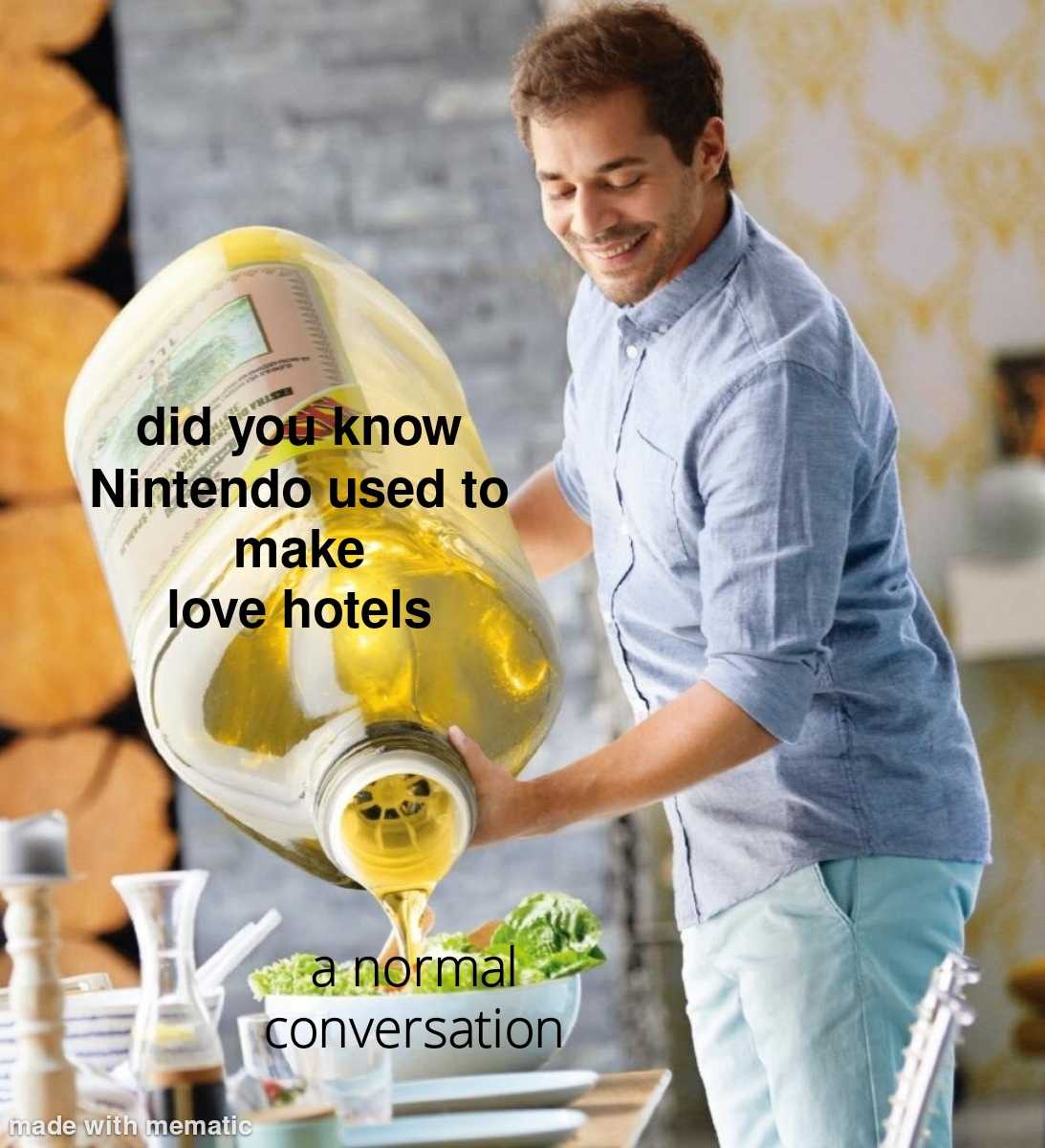 a man pouring olive oil into a bowl of food on a table