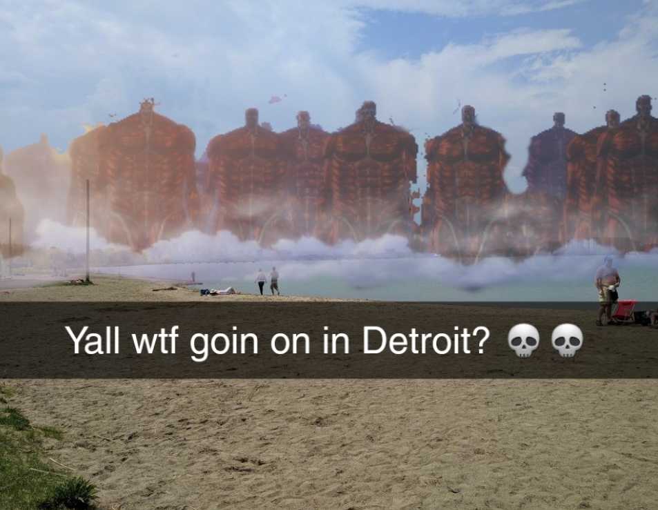 there is a picture of a beach with a giant building in the background