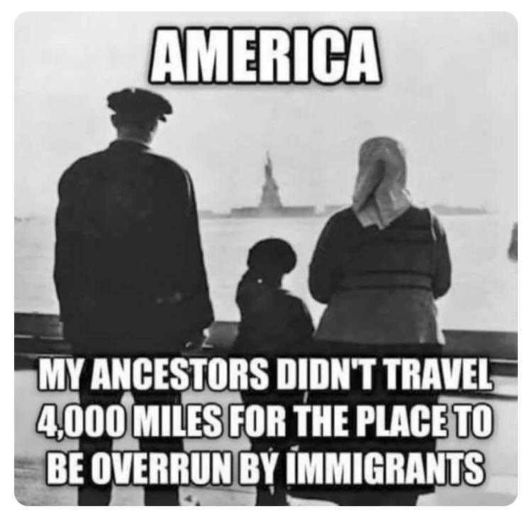 a black and white photo of a family looking at the statue of liberty