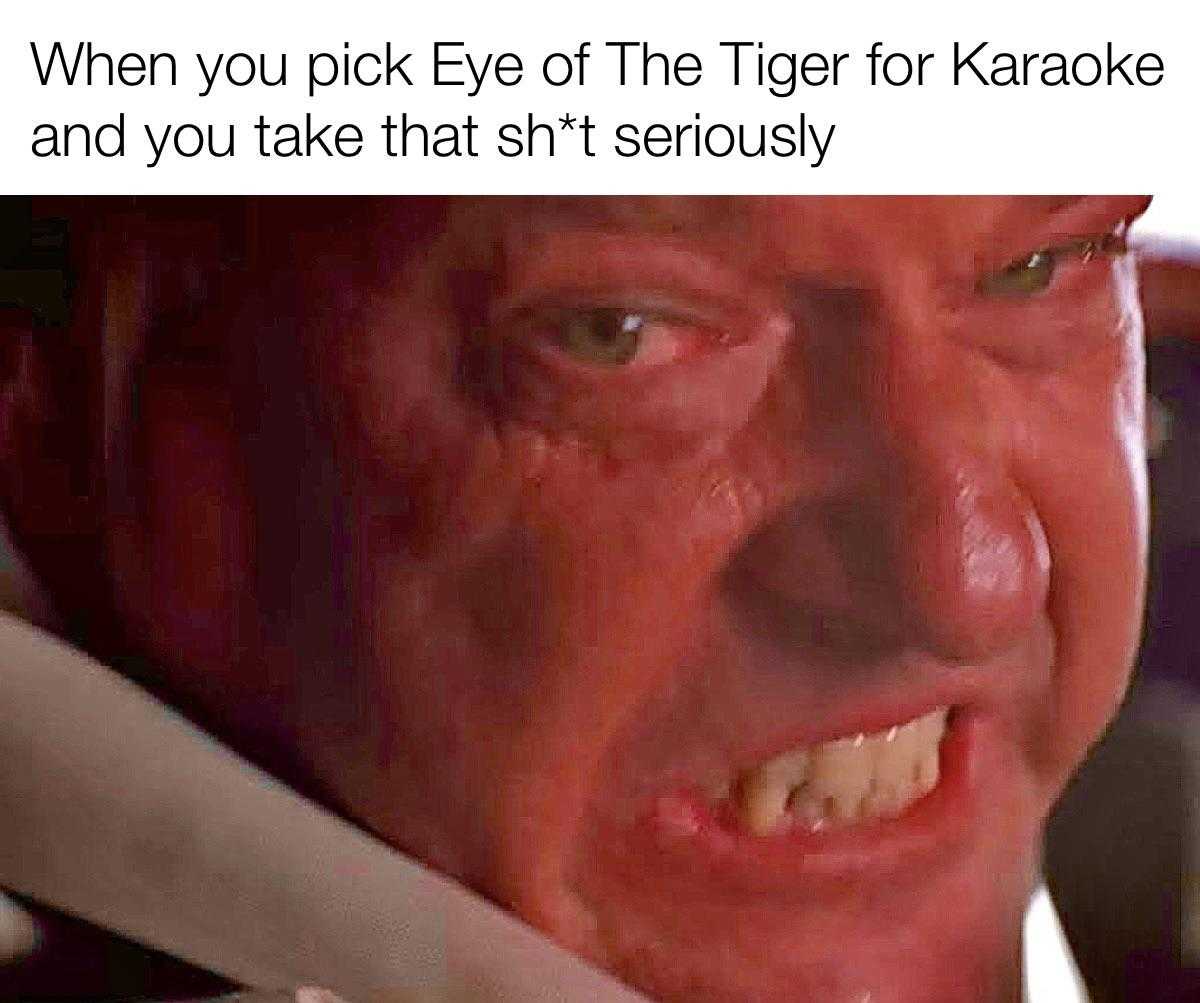 man with a knife in his mouth and a caption that reads, when you pick eye of the tiger for karaoke and you take that shit seriously