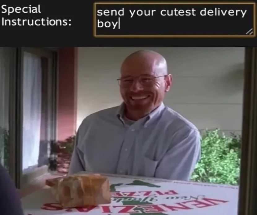 there is a man sitting at a table with a slice of bread