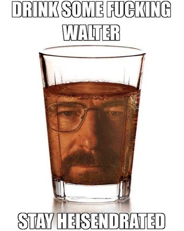 a close up of a glass of water with a man ' s face in it