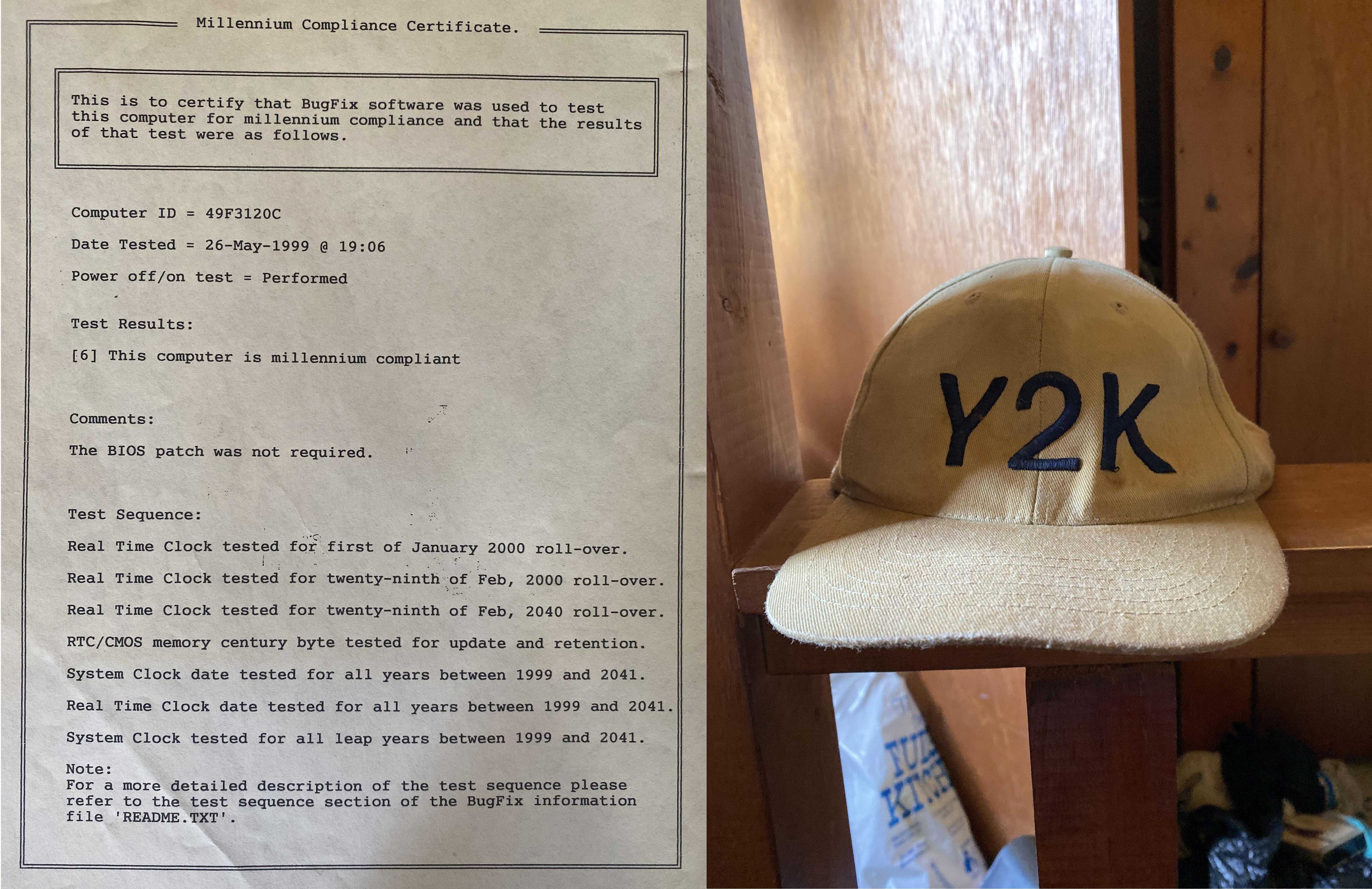 a close up of a hat on a table next to a letter