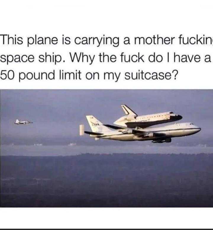 a picture taken from a plane with a space shuttle on top of it