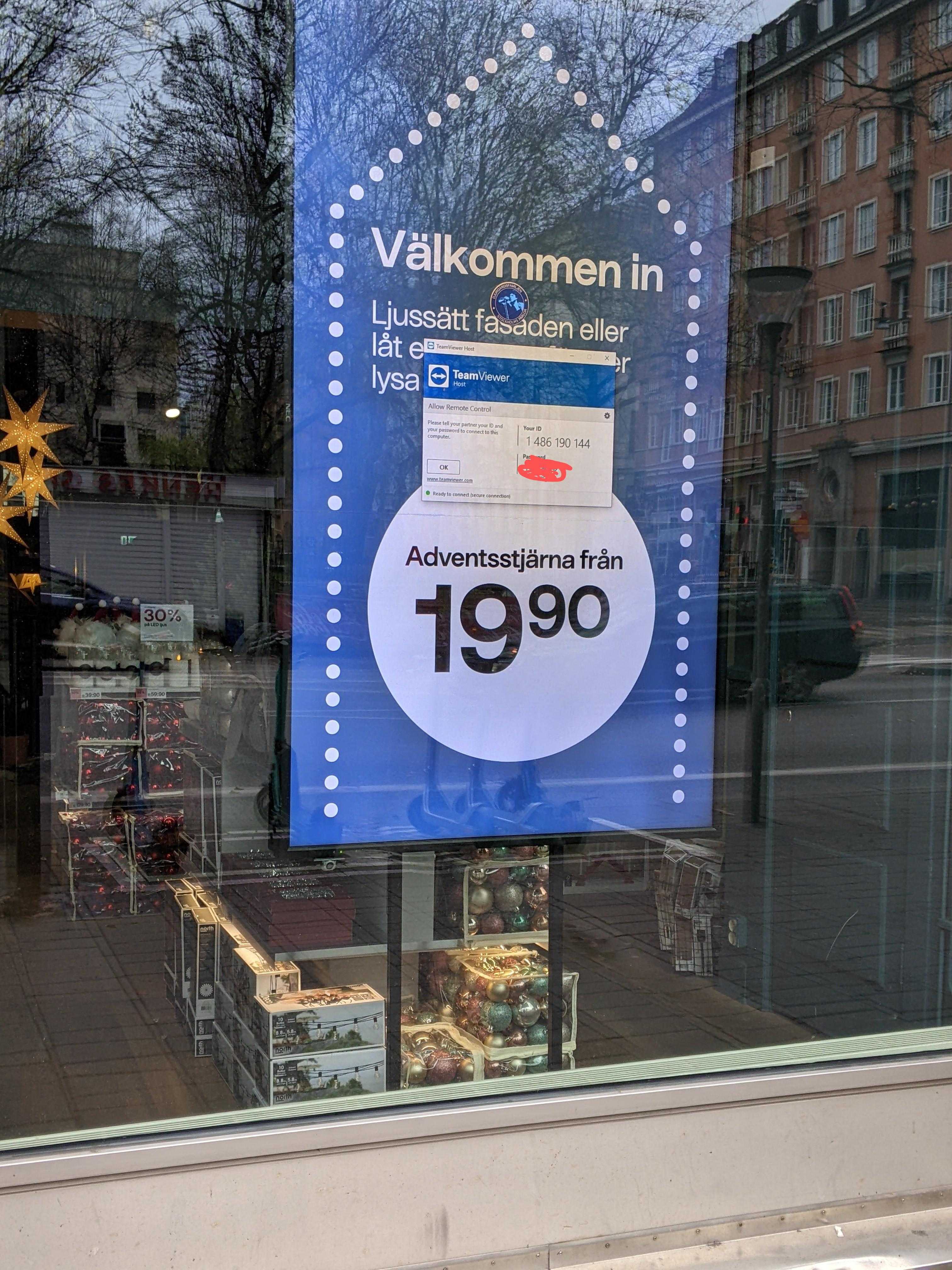 there is a sign in the window of a store advertising a sale