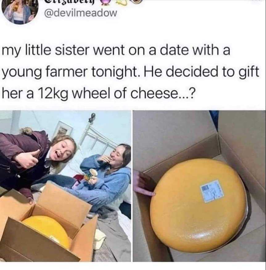 araffed cheese in a box with a woman and a man