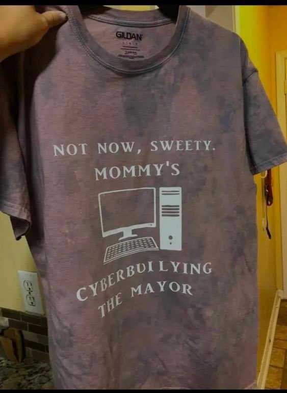 there is a shirt that says not now, sweet mommy ' s cyber bullying the mayor