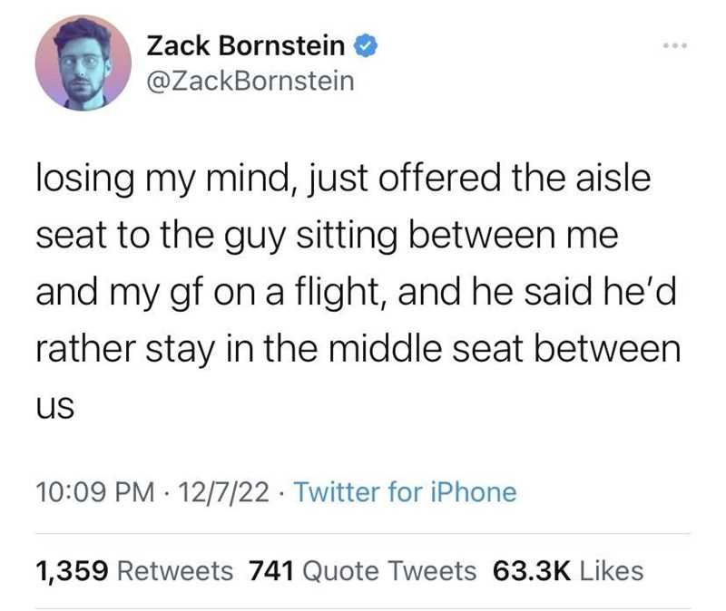 a tweet with a picture of a man sitting on a chair