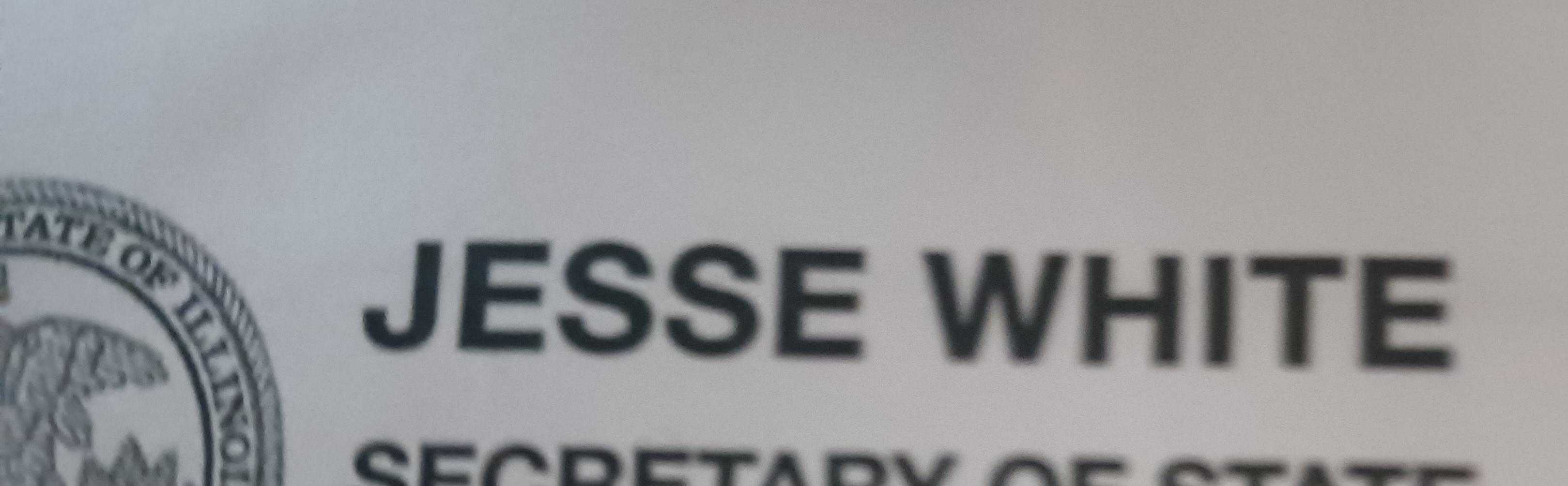 a close up of a sign that says jesse white secretary of state