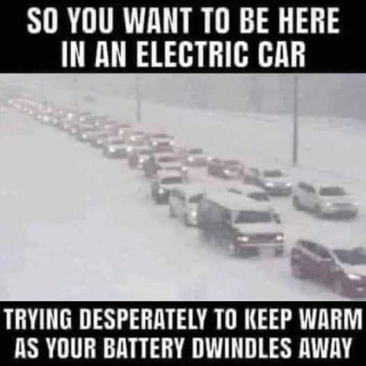 image of a traffic jam with a caption saying, so you want to be here in an electric car trying desperately to keep warm as your battery divides away