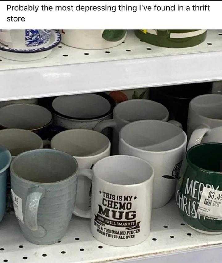 there are many cups on the shelf in the store